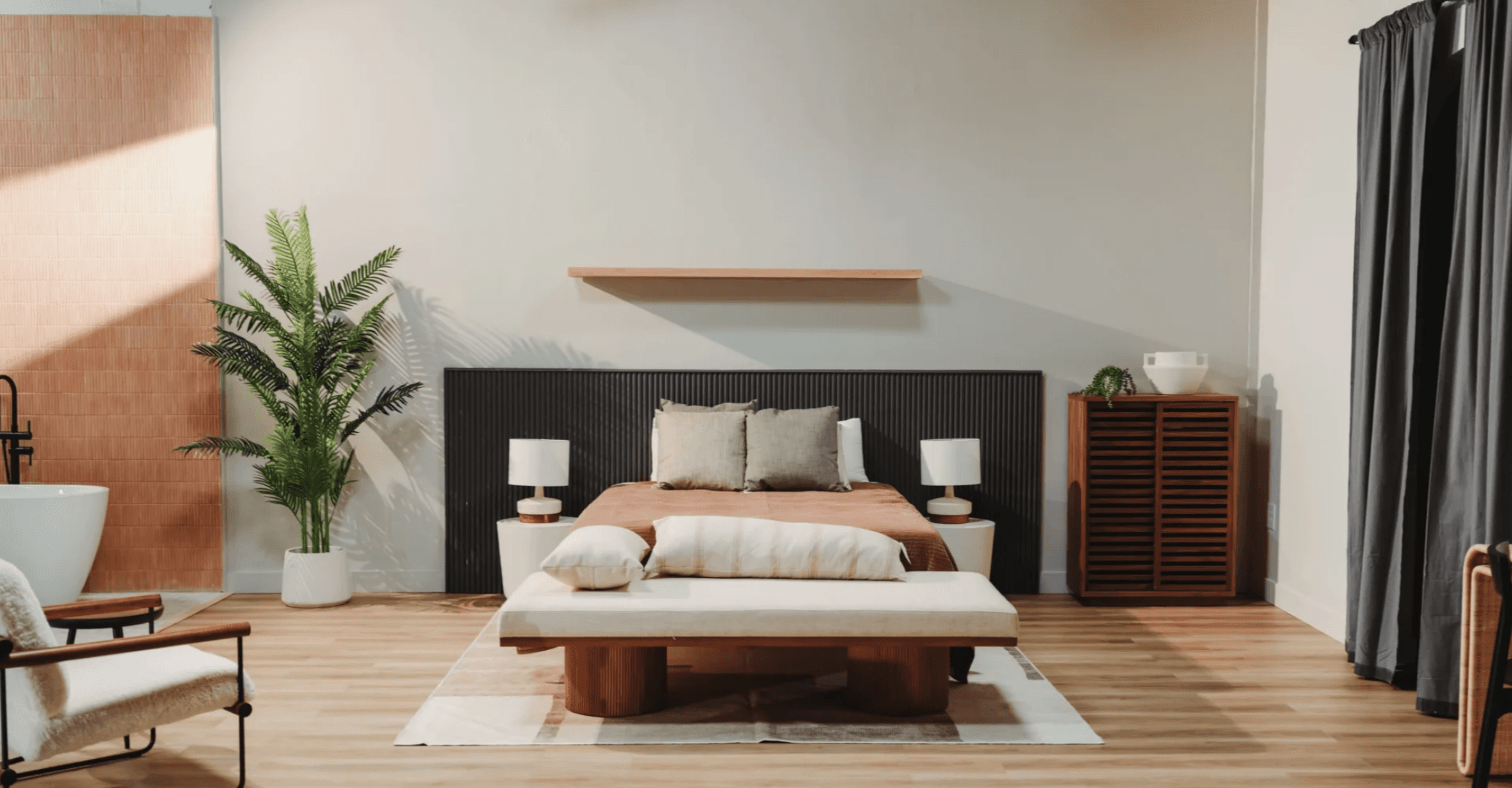 Luxury bedroom suite with freestanding tub for high-end lifestyle and brand campaigns — Los Angeles studio rental